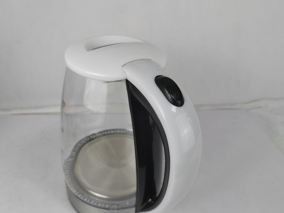 white stovetop tea kettle